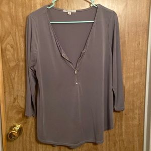 Quarter sleeve dress tee with half zipper